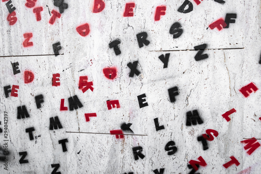 Letters of the alphabet painted on a wall Letters of the alphabet painted on a wall
