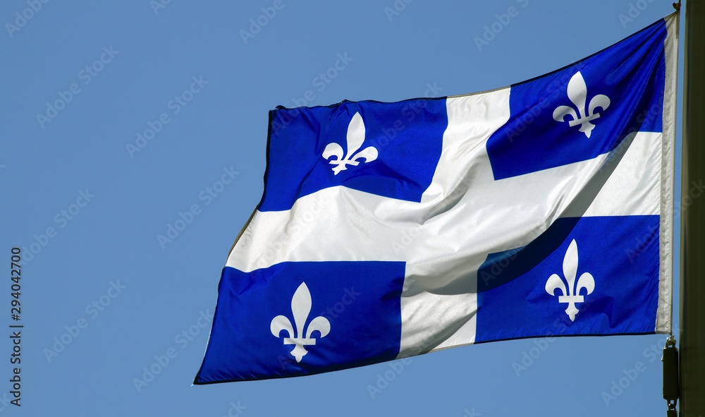 Fototapeta premium flaga quebec kanadyjska kultura francuska maszt montreal niebieski i biały symbol narodowy