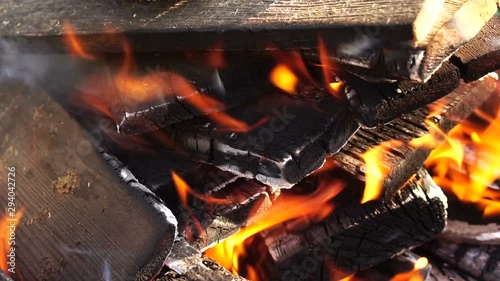 Fire. Burning bonfire made of firewood, close-up. Slow motion.