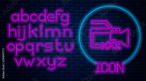 Glowing neon Video camera with inscription XXX icon isolated on brick wall background. Age restriction symbol. 18 plus content sign. Adult channel. Neon light alphabet. Vector Illustration