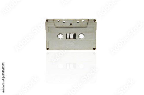 Close up vintage tape cassette isolated on white background.