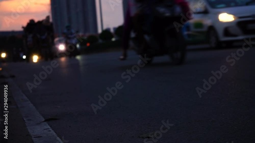 Wallpaper Mural  The road in the evening on which the majority of motorbikes. Torontodigital.ca