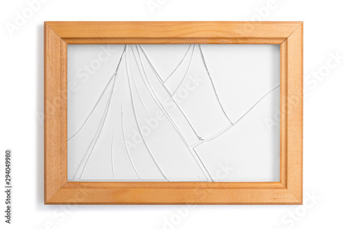 Wooden frame with broken glass on a white background