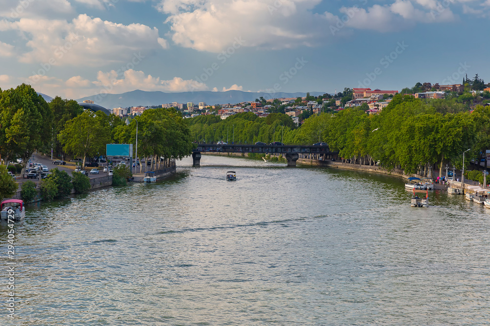 Fototapeta premium Pleasure boats on Kura in Tbilisi