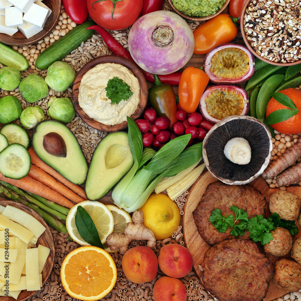 Vegan health food collection with foods high in protein, antioxidants, vitamins, anthocyanins, omega 3, minerals dietary fibre & smart carbs. Flat lay. Vegan health food collection with foods high in protein, antioxidants, vitamins, anthocyanins, omega 3, minerals dietary fibre & smart carbs. Flat lay.