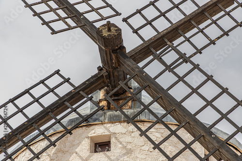 closeup of the rotor and the wooden blades of an old windmill