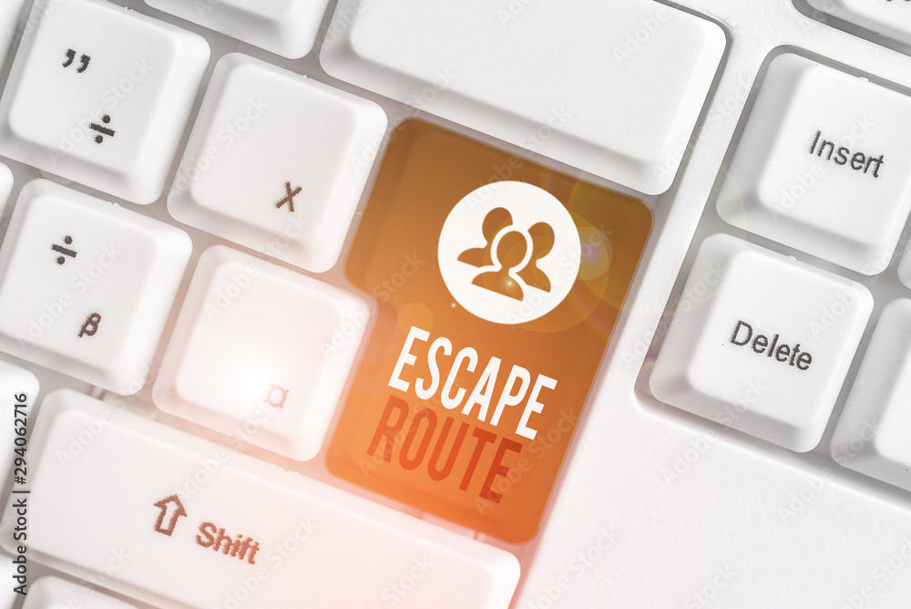Handwriting text writing Escape Route. Conceptual photo a route by which a demonstrating may reach a place of safety White pc keyboard with empty note paper above white background key copy space Handwriting text writing Escape Route. Conceptual photo a route by which a demonstrating may reach a place of safety White pc keyboard with empty note paper above white background key copy space