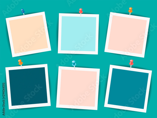 Empty photo frames on a dark turquoise background
