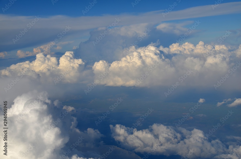 Naklejka premium Clouds in the sky shot from an airplane.