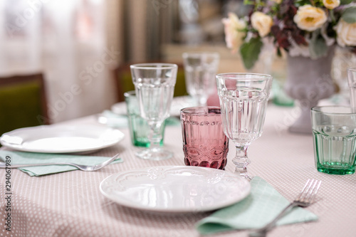 bouquet of flowers in a vase at the wedding table