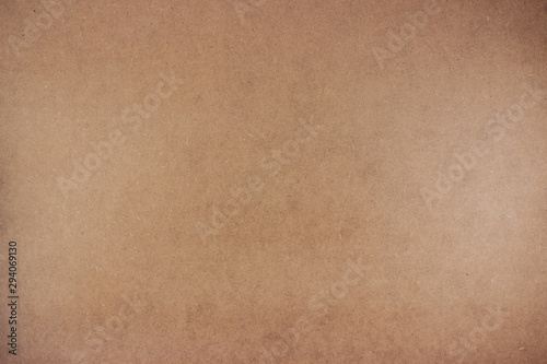Medium Density Fiberboard MDF background. Wooden fiberboard plate texture background. Light brown backdrop for product photography.