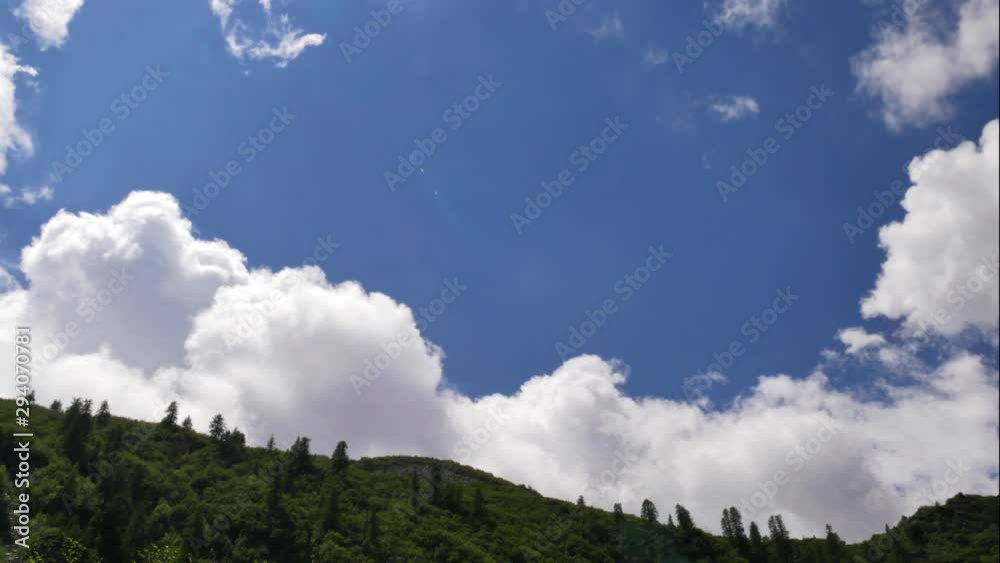 Time lapse clouds rolling puffy cloud are moving white lightnes clouds time lapse Ultra HD sunny clouds Time lapse clouds rolling puffy cloud are moving white lightnes clouds time lapse Ultra HD sunny clouds