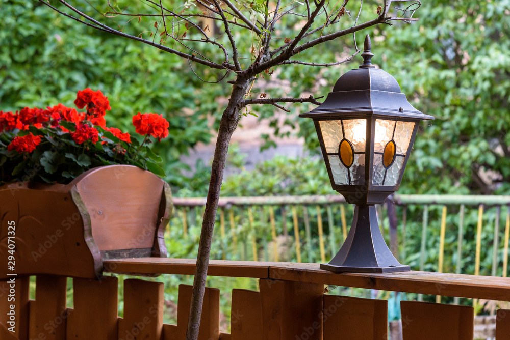 Shining lamp in a garden