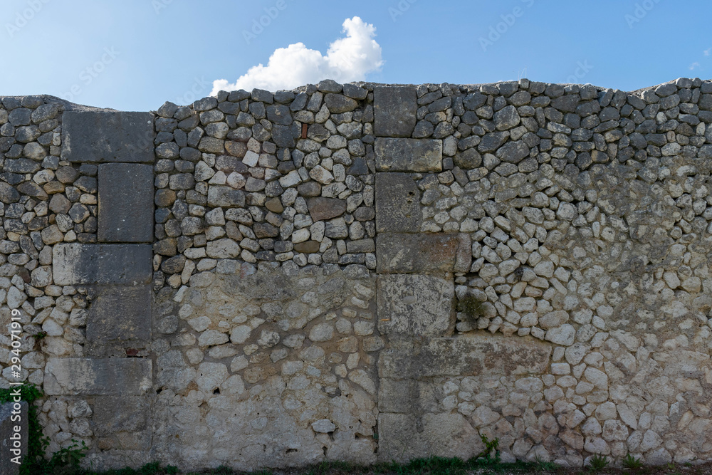 Ancient Roman wall with stone texture Ancient Roman wall with stone texture
