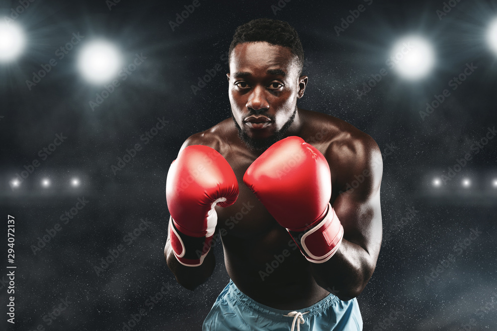Focused boxer ready to attack his contestant