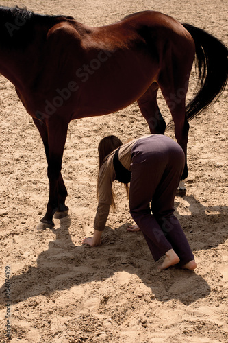photo girl does tricks with a horse © alien_zagrebelna