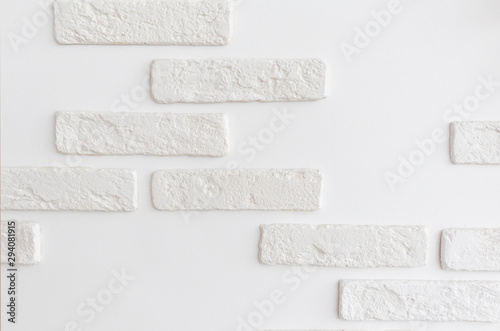 white wall with decorative brick elements