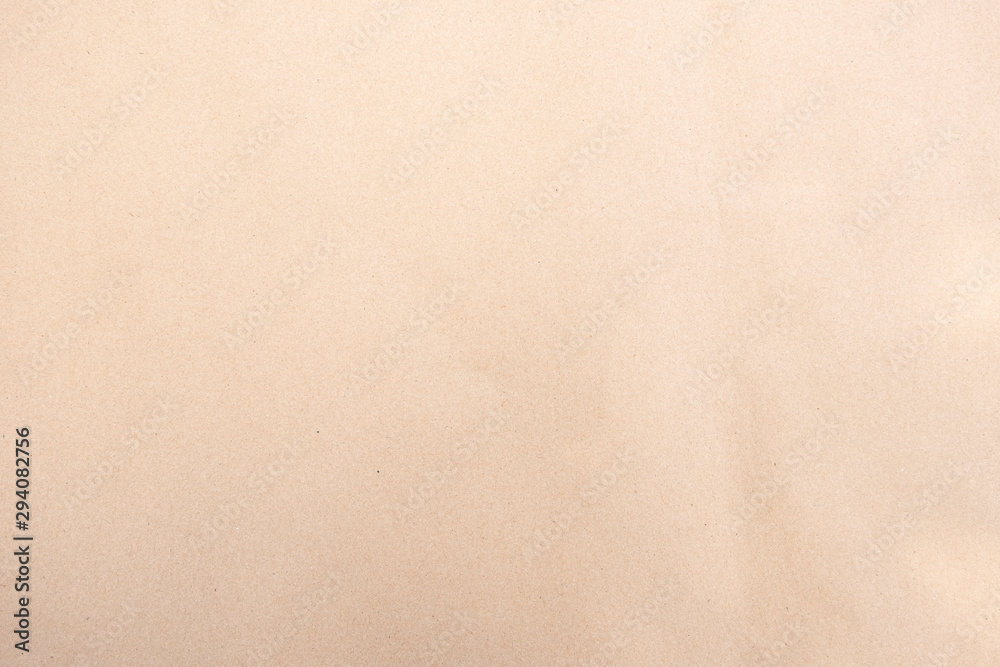 Old  texture brown cardboard sheet of empty paper background.