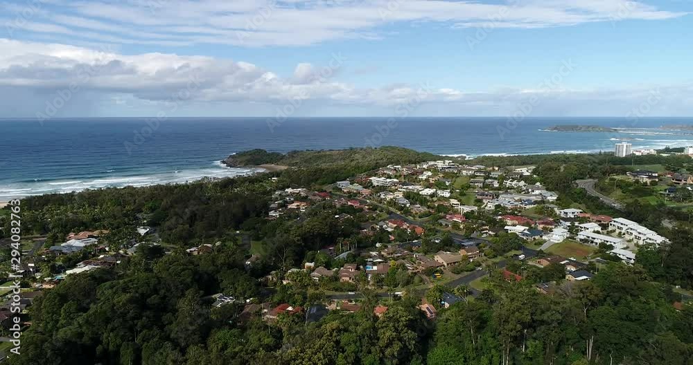 Residential suburbs and streets of Coffs Harbour on Pacific coast of Australia along M1 motorway – town of the big Banana. Residential suburbs and streets of Coffs Harbour on Pacific coast of Australia along M1 motorway – town of the big Banana.