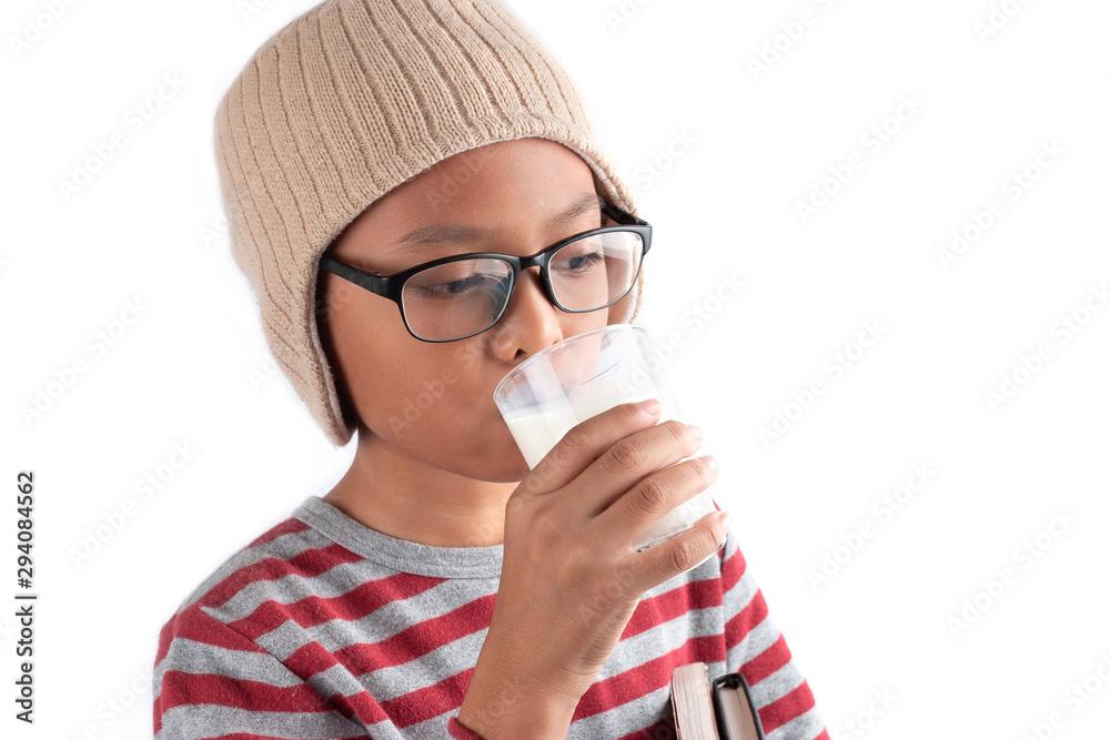 Concept of healthy milk drinking, The little boy with a glass of milk received from a parent. Concept of healthy milk drinking, The little boy with a glass of milk received from a parent.