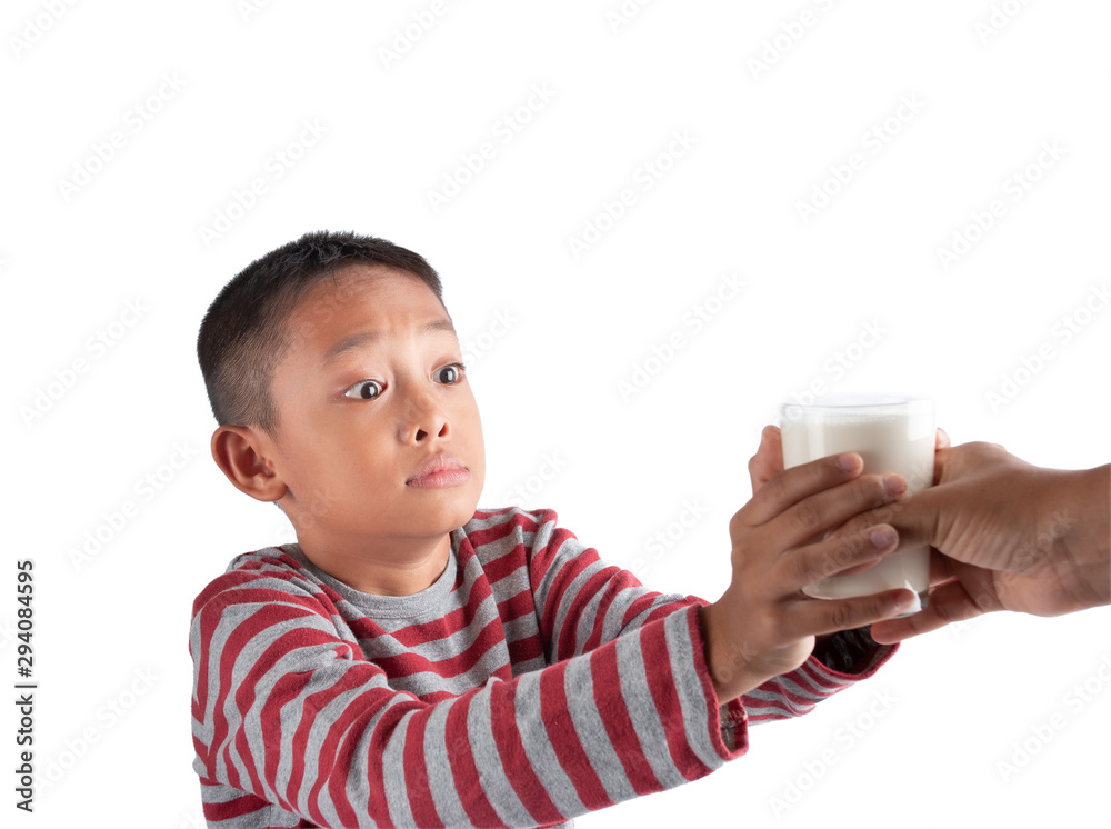 Concept of healthy milk drinking, The little boy is happy with a glass of milk received from a parent. Concept of healthy milk drinking, The little boy is happy with a glass of milk received from a parent.
