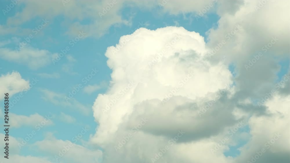 Video, Blue sky and clouds. Beautiful piling up clouds on a blue calm sky. Video, Blue sky and clouds. Beautiful piling up clouds on a blue calm sky.