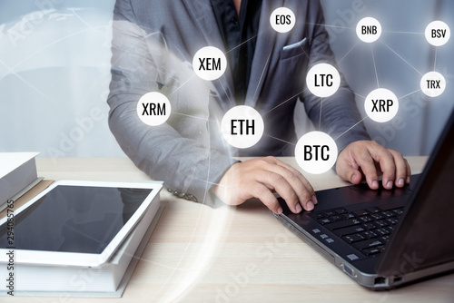 business man using laptop with connection crypto currency line on virtual screen