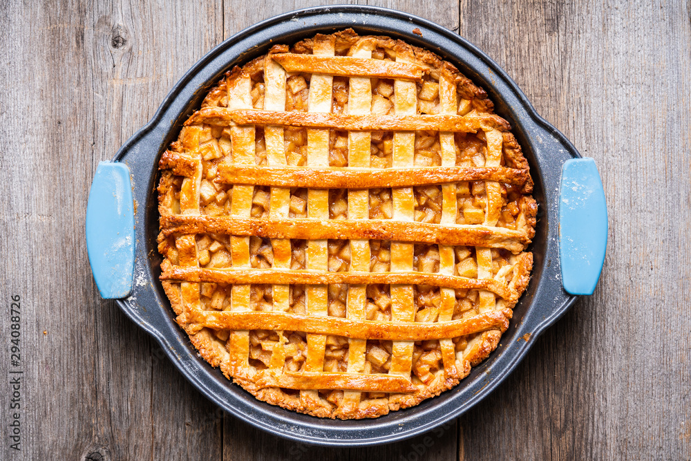 Freshly baked autumn apple pie with cinnamon. Selecive focus. Shallow depth of field. Freshly baked autumn apple pie with cinnamon. Selecive focus. Shallow depth of field.