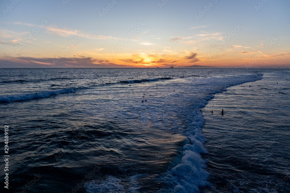 sunset over the sea in Huntington Beach, California 