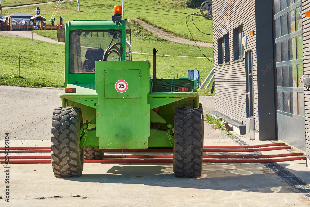 Green Lifting Engine Parked At Mountain Ski Resort Green Lifting Engine Parked At Mountain Ski Resort