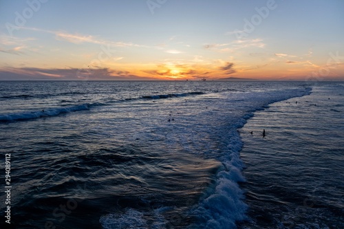 sunset over the sea in Huntington Beach, California 