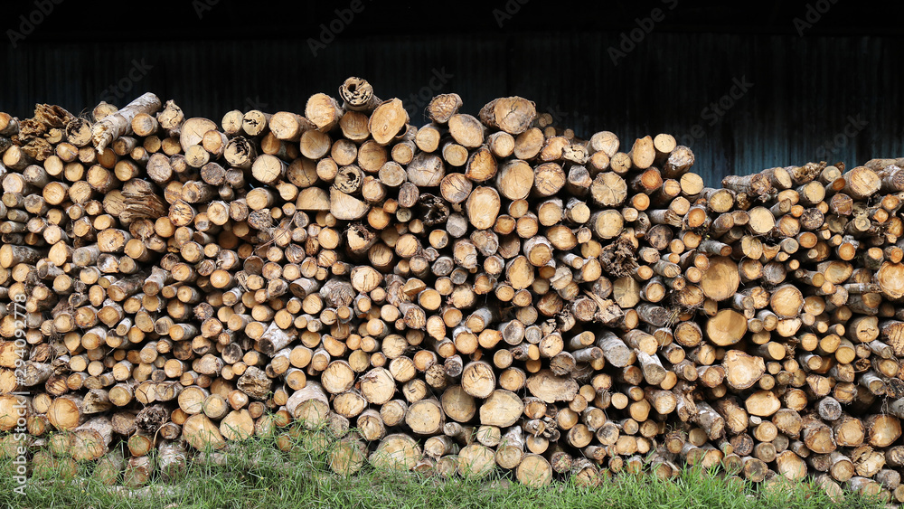 Wood long timber stack for charcoal factory background