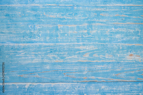 Blue color rustic rough wood texture background.