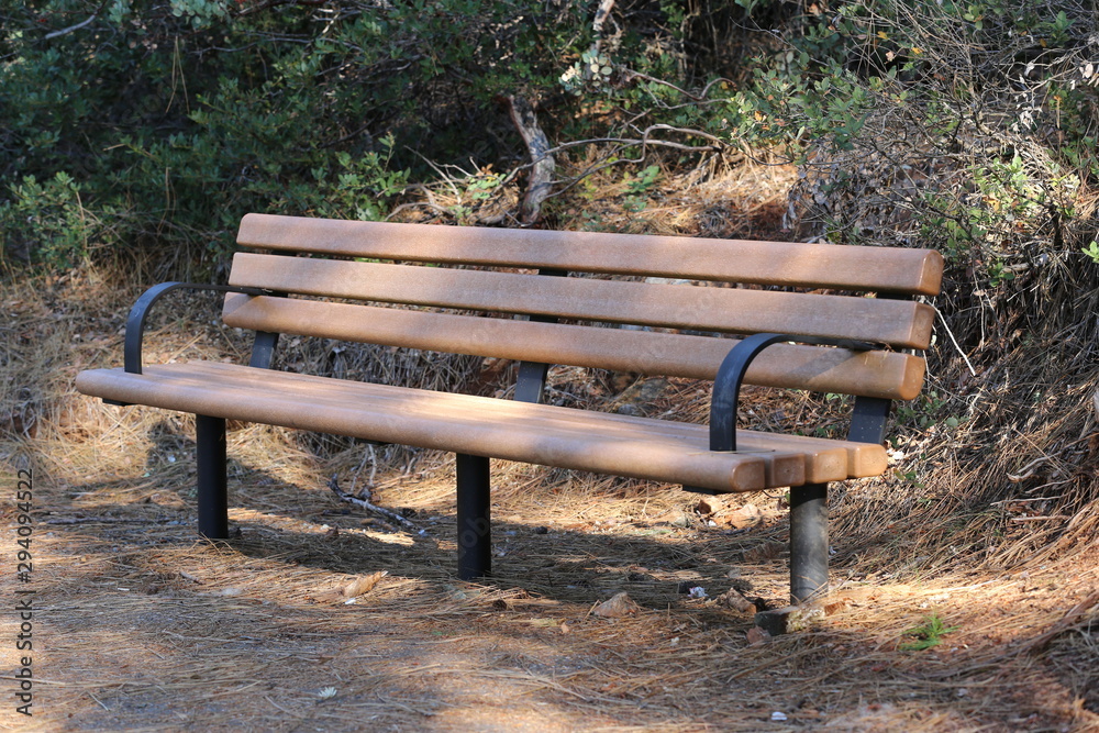 brown bench in the park