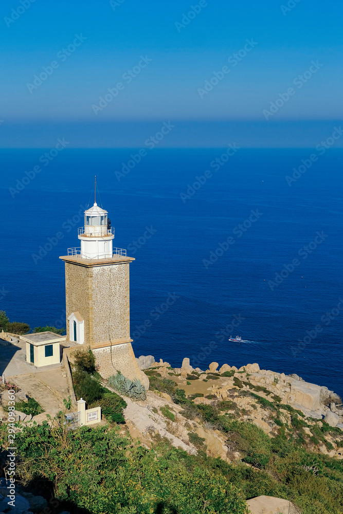 Landscape of a nice lighthouse in seashore Mui Dinh, Ninh Thuan, Viet Nam. Royalty high quality free stock image of sea landscape.