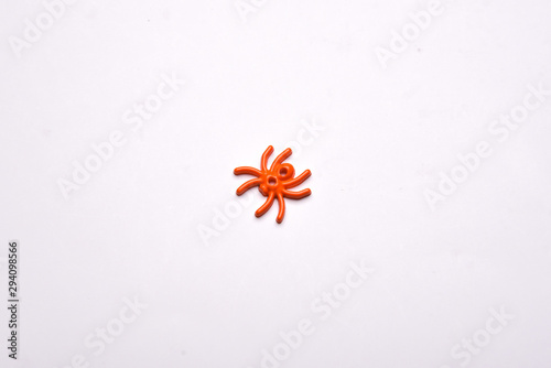 Halloween decorations spider  on white background , Halloween holiday background , top view