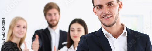 Obraz na płótnie Group of people show ok or confirm with thumb up during conference closeup. High level quality product serious offer excellent education mediation solution creative advisor participation concept w salonie