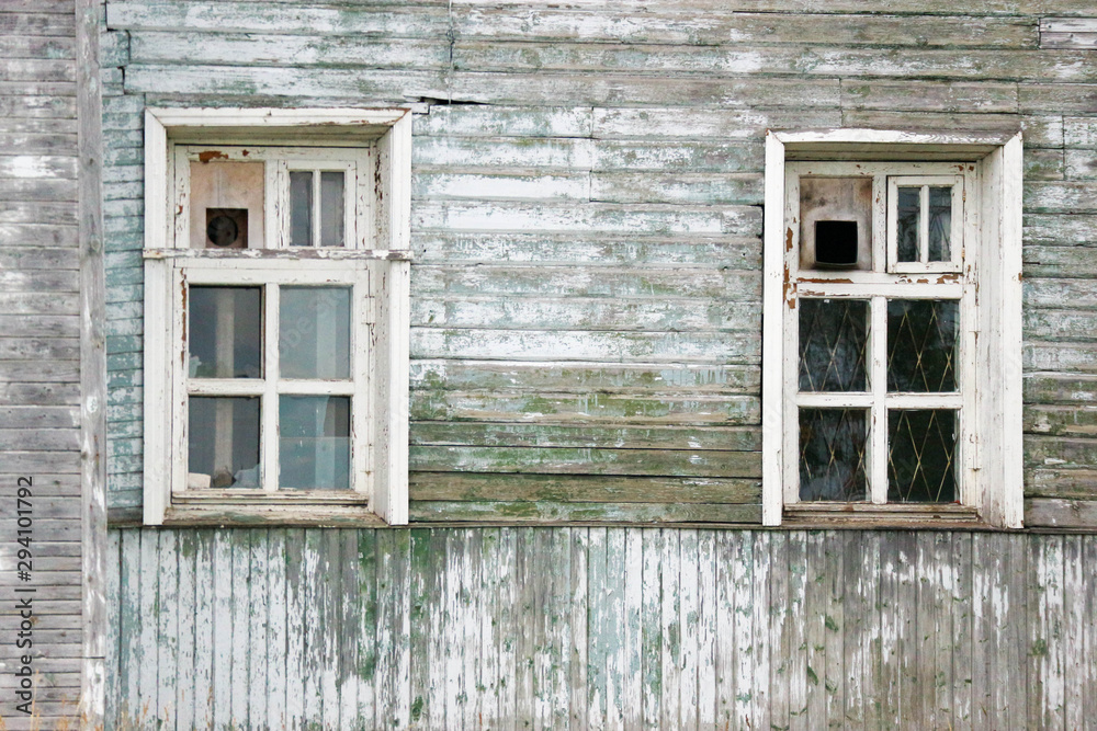 window in an old shabby house in dying city window in an old shabby house in dying city