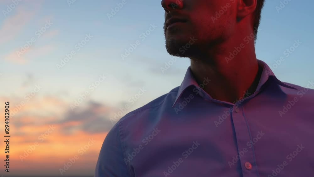 Lonely man looking for inspiration breathing fresh evening air, magic hours Lonely man looking for inspiration breathing fresh evening air, magic hours