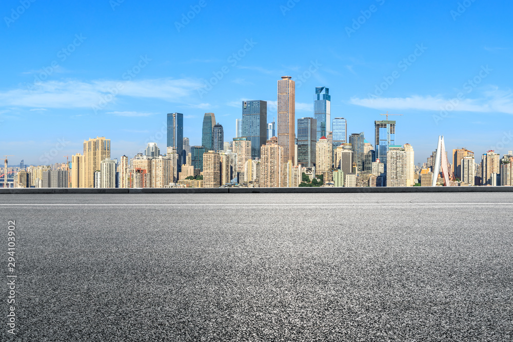 Asphalt highway passes through the city financial district in Chongqing,China. Asphalt highway passes through the city financial district in Chongqing,China.