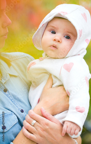 Baby newborn care moms mom’s arms park walk in  nature photo