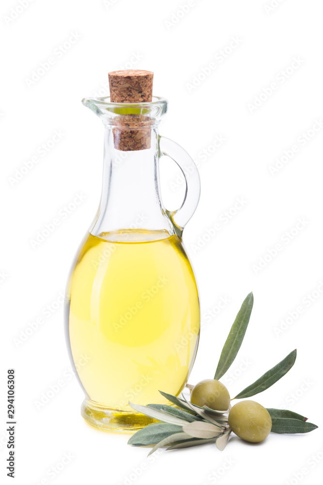 Olive oil in a glass bottle, fresh olives and olive branch. Olive oil in a glass bottle, fresh olives and olive branch.