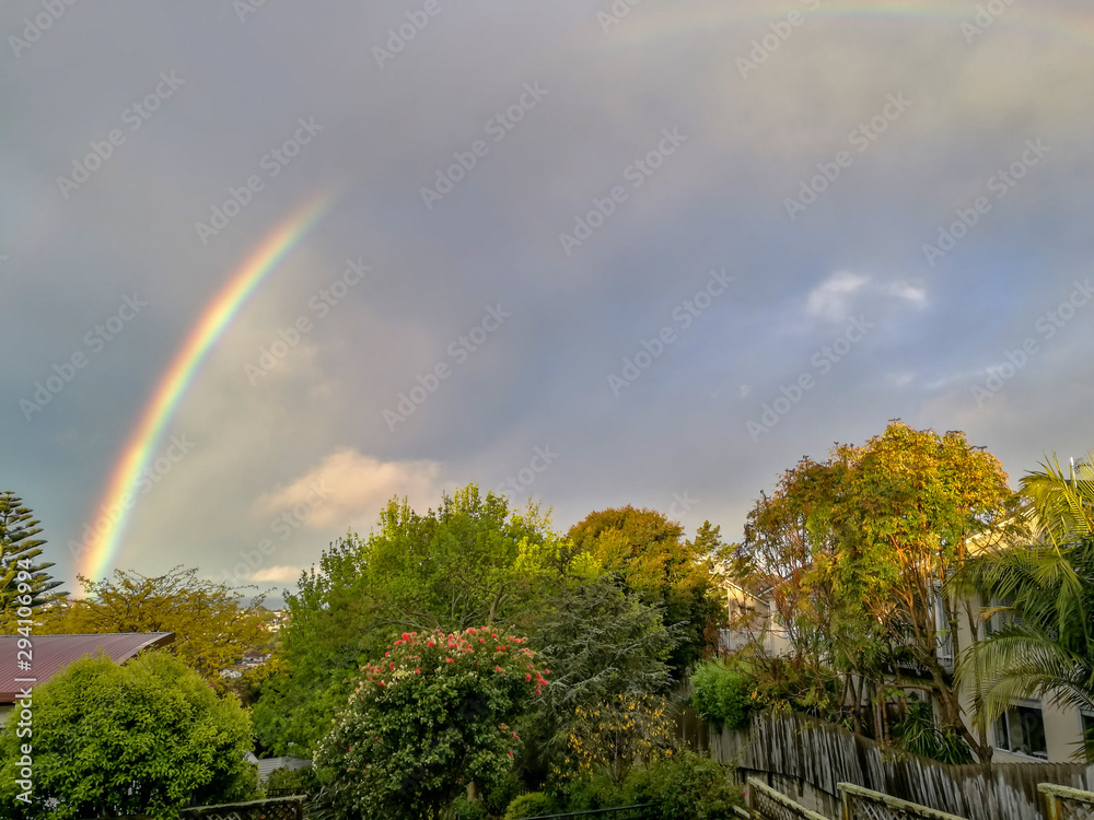 Rainbow view from the window in Browns Bay, Auckland, New Zealand Rainbow view from the window in Browns Bay, Auckland, New Zealand