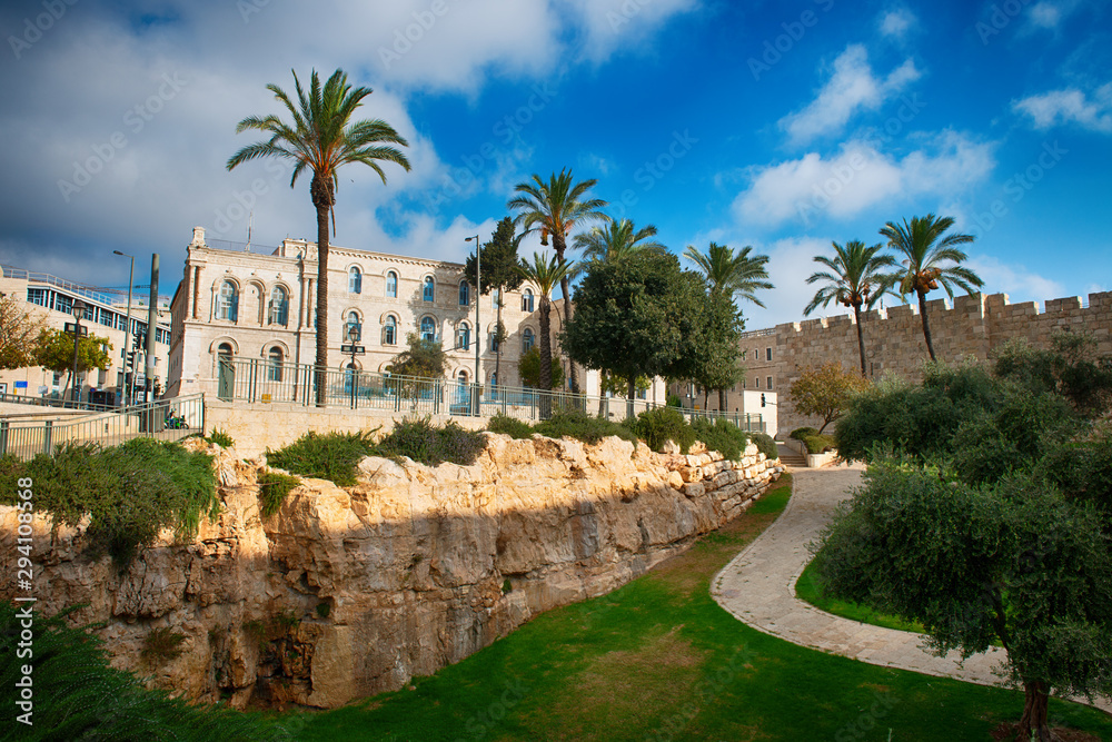 View of the fragment of the square and the rising walls of the old city in Jerusalem.