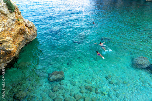 Konstfotografi people swimming scuba diving rocky scenic mali bok orlec natural beach on cres i