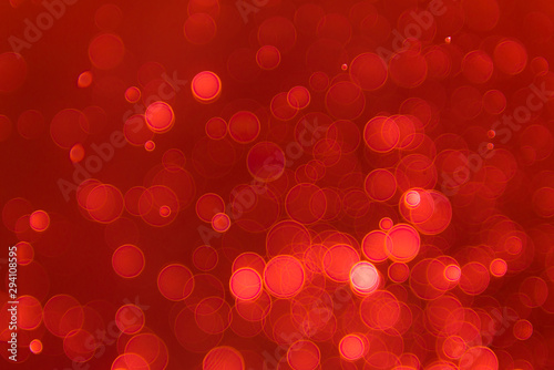 abstract sparkle bokeh light effect with red background, abstract bokeh background