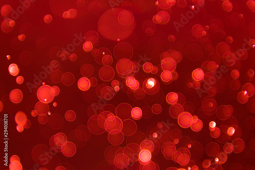 abstract sparkle bokeh light effect with red background, abstract bokeh background