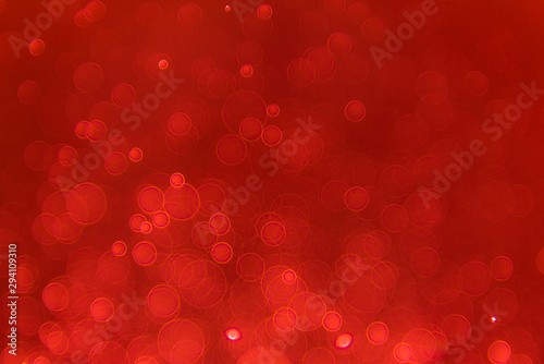 abstract sparkle bokeh light effect with red background, abstract bokeh background