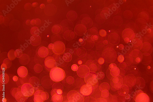 abstract sparkle bokeh light effect with red background, abstract bokeh background