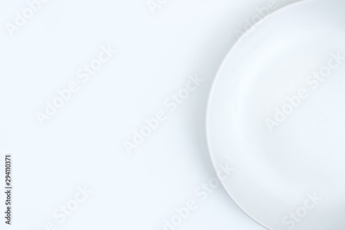 Empty plate on a white background with copy space.